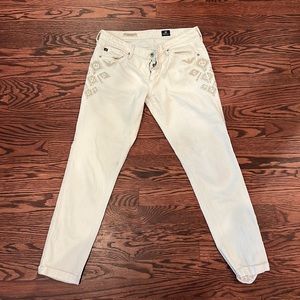 AG size 28 pants but fit like a 27. Great condition and barely worn.